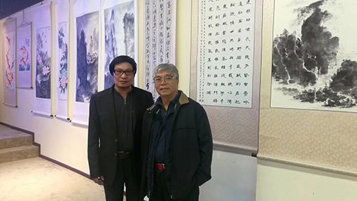刘砚军老师与中国书法家协会副主席张飚合影.JPG