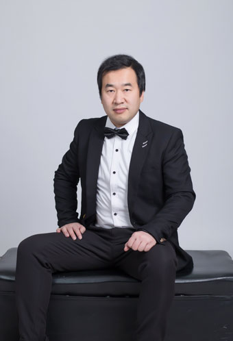 邹庆建照片官网.jpg
