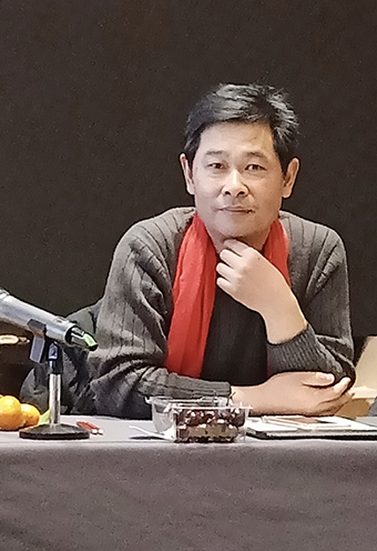 周明荣.jpg