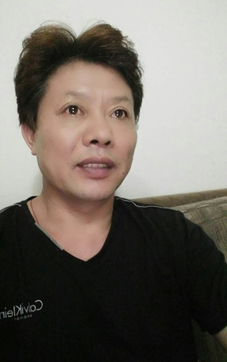 何明亮 何明亮